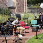 Piano, guitare électrique et batterie